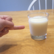 Illustration for article titled Astounding: 7 Incredible Photos Of Hands Pointing To Glasses Of Milk With Their Ring Fingers